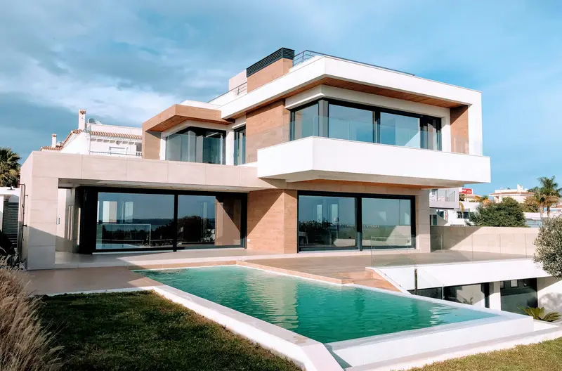 Modern luxury villa with a pool, the kind of listing a Dubai real estate website has to present well